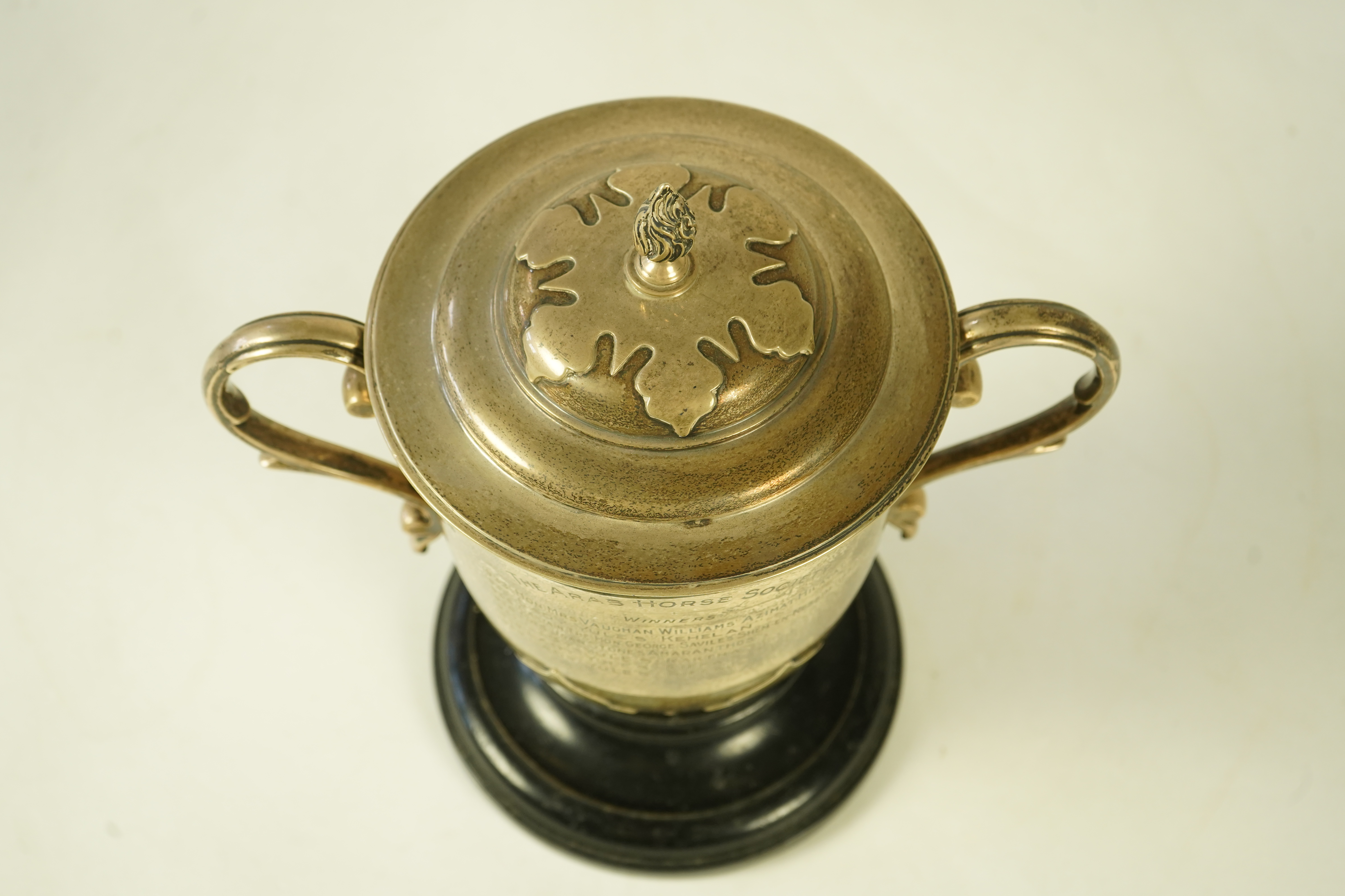 A George V silver two handled presentation cup and cover by Johnson, Walker & Tolhurst, with later engraved horse racing inscription relating to 'The Arab Horse Society Challenge Cup for the Best Arab Colt'